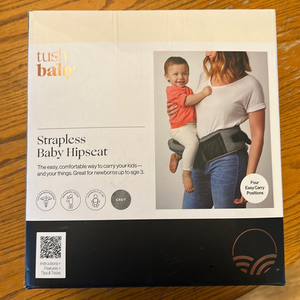 TUSHBABY BRAND NEW strapless hip seat. NEVER USED
